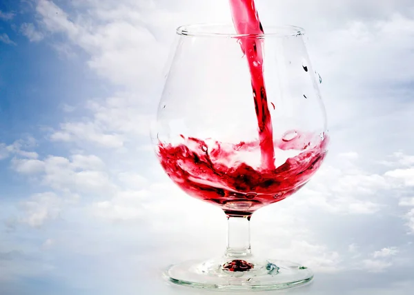 a splash of red wine when poured into a glass