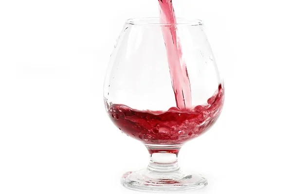 赤ワイン グラスに注いだときのスプラッシュ — ストック写真