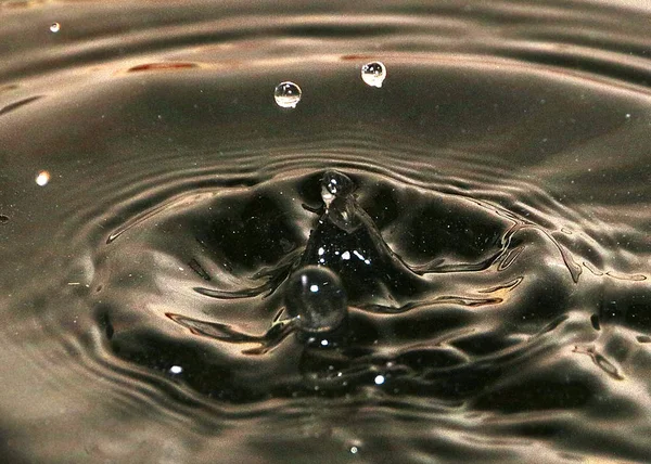 Drops Splashes Surface Barrel Oil — Stock Photo, Image