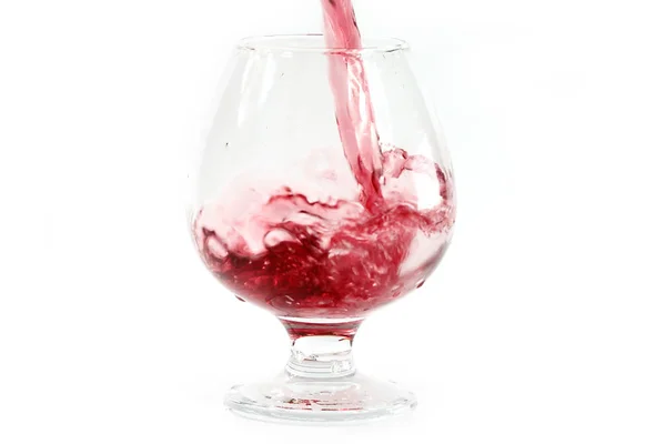 Rotwein Ergießt Sich Ins Glas Und Erzeugt Exquisite Spritzer Und — Stockfoto