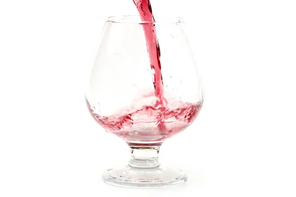 Rotwein Ergießt Sich Ins Glas Und Erzeugt Exquisite Spritzer Und — Stockfoto