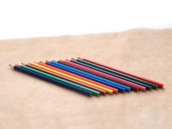 Set Colored Pencils Drawing Lies Piece Real Leather — Stock Photo, Image