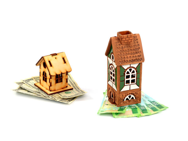 a wooden hut stands on dollars and a stone house stands on Russian rubles