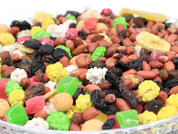 candy dry fruits, nuts and candied fruit as a fruit mix for snacks