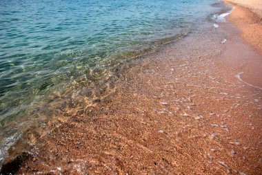 deniz suyu ve kumlu plaj sahil temizleyin