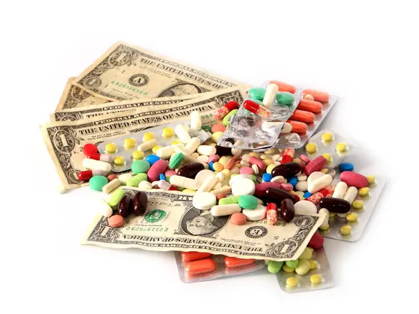 Montón Medicamentos Pastillas Junto Dólares Americanos — Foto de Stock