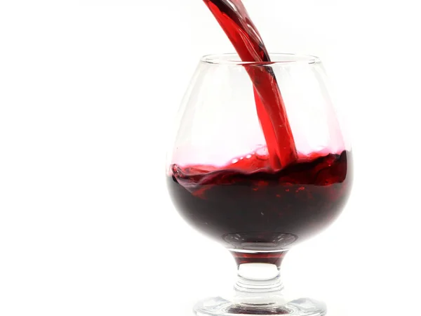 Ροής Του Κρασιού Δημιουργεί Πρότυπα Όταν Διοχετεύονται Ένα Ποτήρι — Φωτογραφία Αρχείου