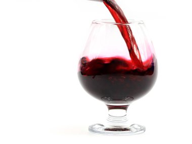 kırmızı şarap üzüm bir cam içine dökme güzel desenler oluşturmak