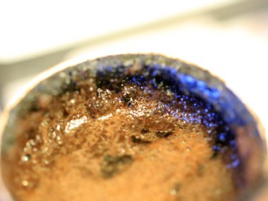 coffee foam on the surface of the drink during preparation