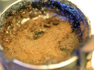 coffee foam on the surface of the drink during preparation