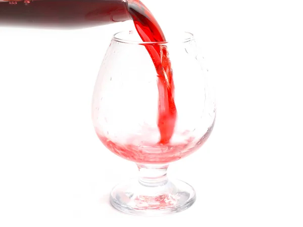 ジェット パターン グラスに赤ワインを注ぐとき — ストック写真