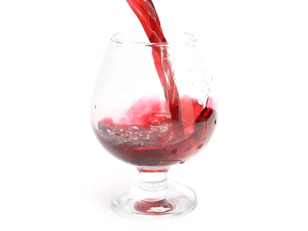 グラスに注いだときのエレガントな赤ワイン スプラッシュ パターン — ストック写真