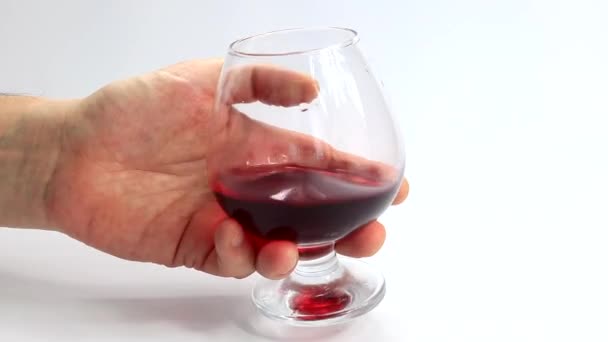 在玻璃中的红酒表面的微妙的亮点和图案 — 图库视频影像
