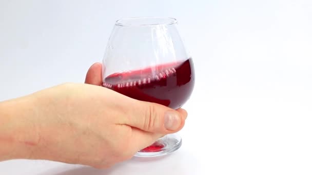 Narin Parlak Nokta Bir Bardak Kırmızı Şarap Yüzeyinde Desenler — Stok video
