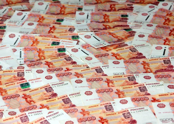 一堆俄罗斯5000卢布的钞票作为交易系统的一部分 — 图库照片