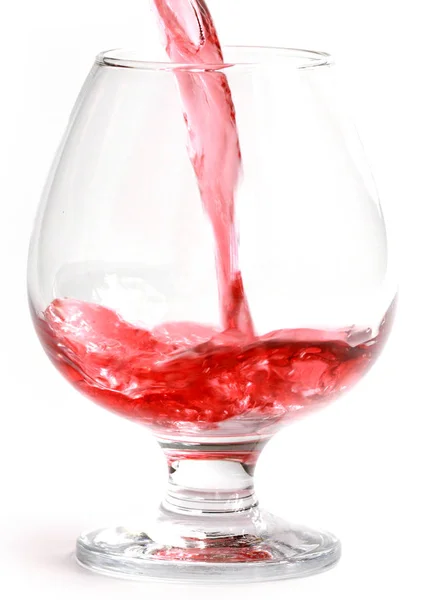 Ροή Κόκκινου Κρασιού Όταν Χύνεται Ένα Ποτήρι Πόσιμου — Φωτογραφία Αρχείου