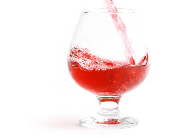 Stänk Och Droppar Ett Glas Medan Hälla Rött Vin — Stockfoto