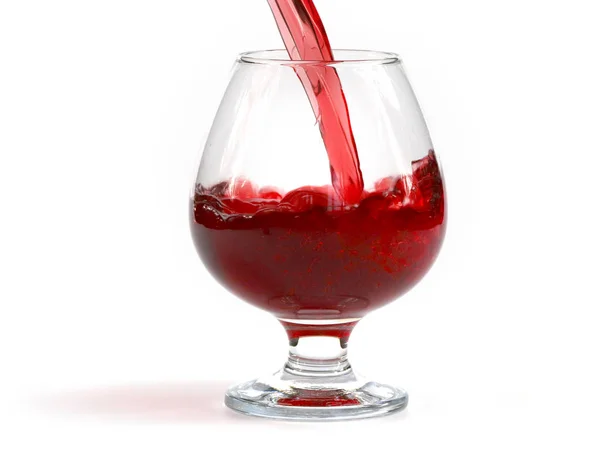 グラスに注ぐときの流れと赤ワインの滴 — ストック写真
