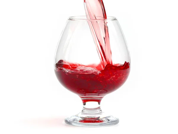 Ροή Και Σταγόνες Κόκκινου Κρασιού Όταν Χύνονται Ένα Γυαλί — Φωτογραφία Αρχείου