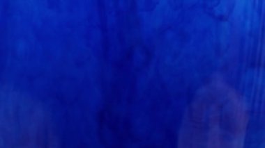 iki sıvı boya karıştırırken çok renkli desenler