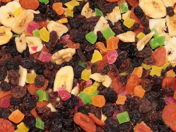 dried slices and pieces of candied fruit as part of a treat