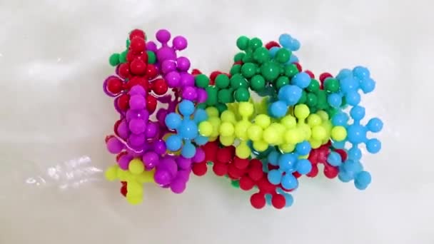 Plastic Model Virus Molecule Stream Water — Stock Video