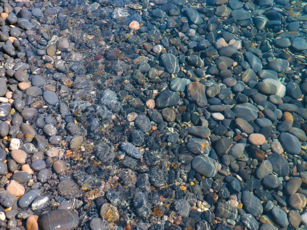 Superficie Una Playa Guijarros Olas Agua Mar Clara — Foto de Stock