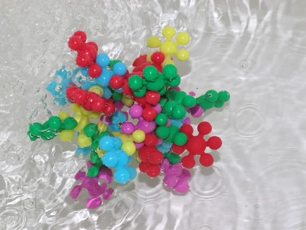 Plastic Model Virus Stream Dirty Liquid — Stock Photo, Image
