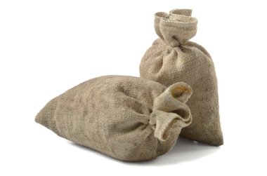 Beyaz arkaplan üzerinde bir çanta dolusu kalın kumaş (fotoğraf düzenleme / kolajlarınız için boş))