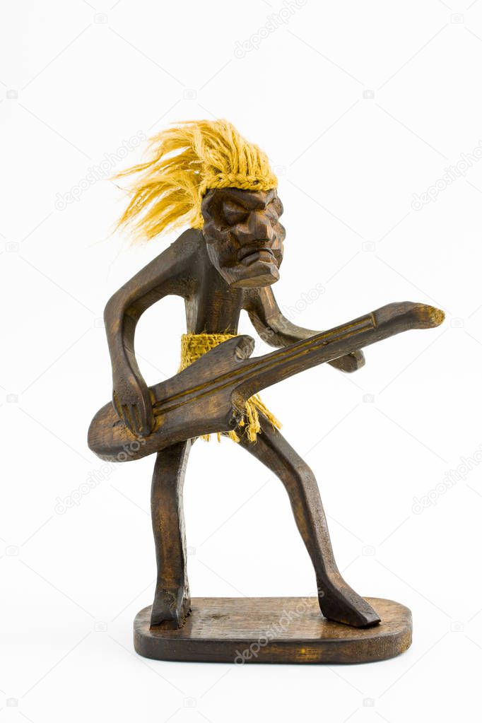 Wooden figure of a man with a guitar 