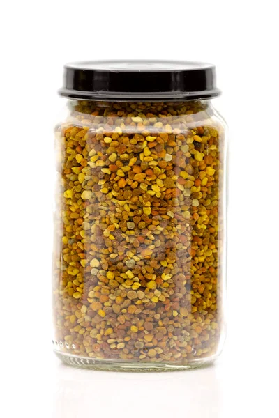 ガラス瓶の中の蜂花粉顆粒 被写界深度が浅い選択フォーカス ストック写真