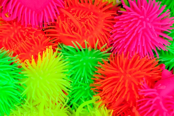 Background Colorful Fluffy Plastic Toys — Stock Photo, Image