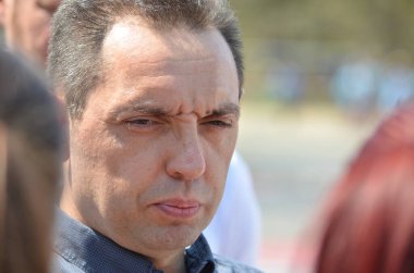 BELGRADE, SERBIA - CIRCA 2017: Aleksandar Vulin. He has served as the Minister of Defence of Serbia from 29 June 2017. The photo comes from car races held at 