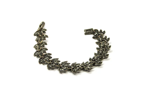 Female metallic bracelet isolated on white background