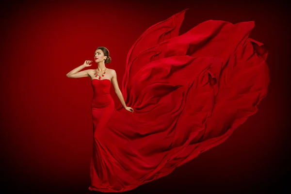 Fashion Model Red Flaming Dress, Woman in Long Fluttering Gown Stock Image