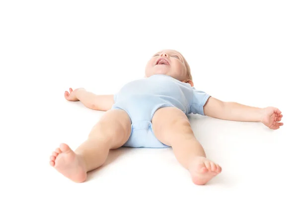 Baby liggande på vitt, Happy Infant Kid på ryggen, Funny Boy barn — Stockfoto