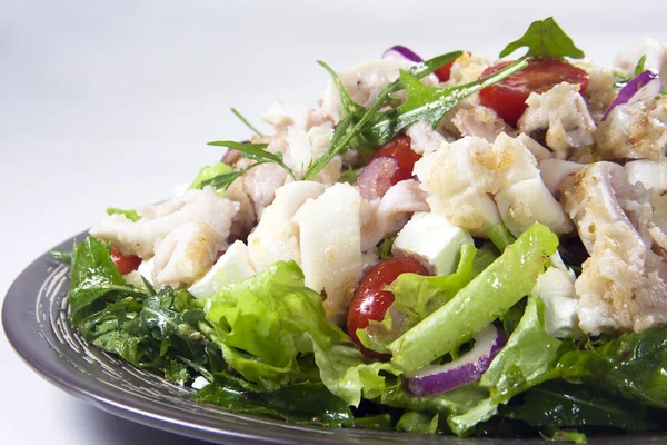 Salad with fried squid — Stock Photo, Image