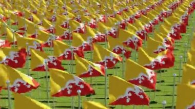 Bhutan yeşil alanda birçok bayrakları. Üç boyutlu 3d animasyon oluşturma.