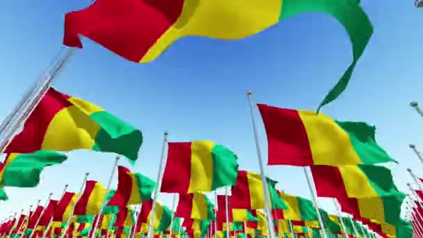 Birçok Ulusal Bayrakları Gine Mavi Gökyüzü Karşı Boyutlu Animasyon Oluşturma — Stok video