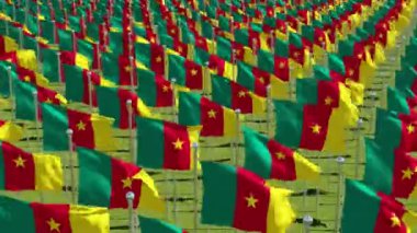Güneşli bir günde yeşil alana rüzgarda üfleme Kamerun bayrakları. 3D render animasyon