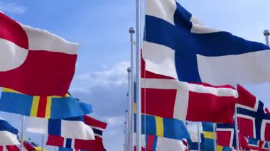 Scandinavian national flags in front of blue sky. Nordic countries.Norway, Sweden, Finland, Denmark, Iceland and Faroe Islands. Scandinavia and Baltic countries.
