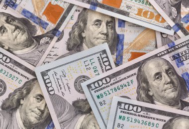 Finansal arka plan: yüz dolarlık banknot, yakın