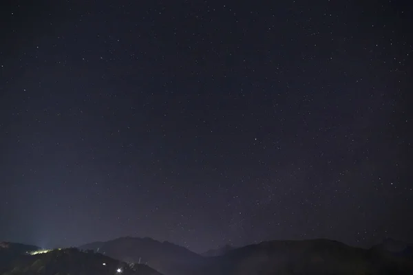 night sky above Himalayas mountains in Dharamshala, India