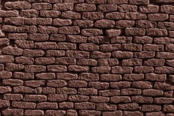 dark red grunge wall made of bricks