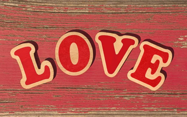 Aşk Kelimesi Eski Kırmızı Tahtadaki Tahta Harflerden Yapılmıştır — Stok fotoğraf