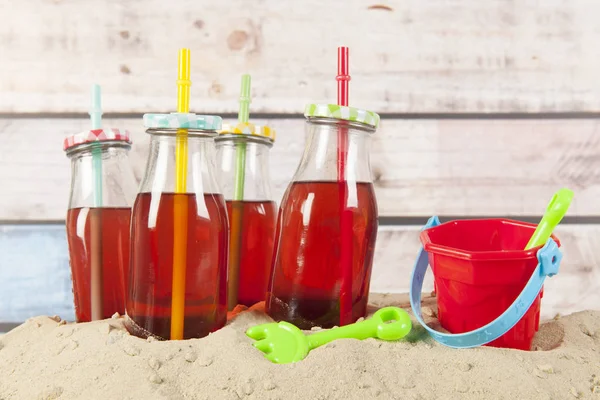 Bottles Red Lemonade Drinking Straw — Stock Photo, Image