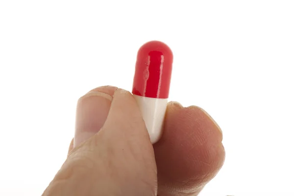 Old Hand Capsule Pill Red White — Stock Photo, Image