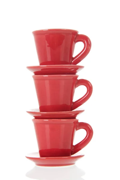 Stacked Red Cups Saucers Isolated White Background — Stock Photo, Image