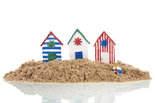 Colorful handmade beach cabins on island — Stock Image Colorful handmade beach cabins on island Stock Photo