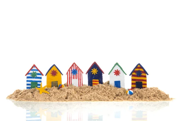 Colorful handmade beach cabins on island — Stock Image Colorful handmade beach cabins on island Stock Photo